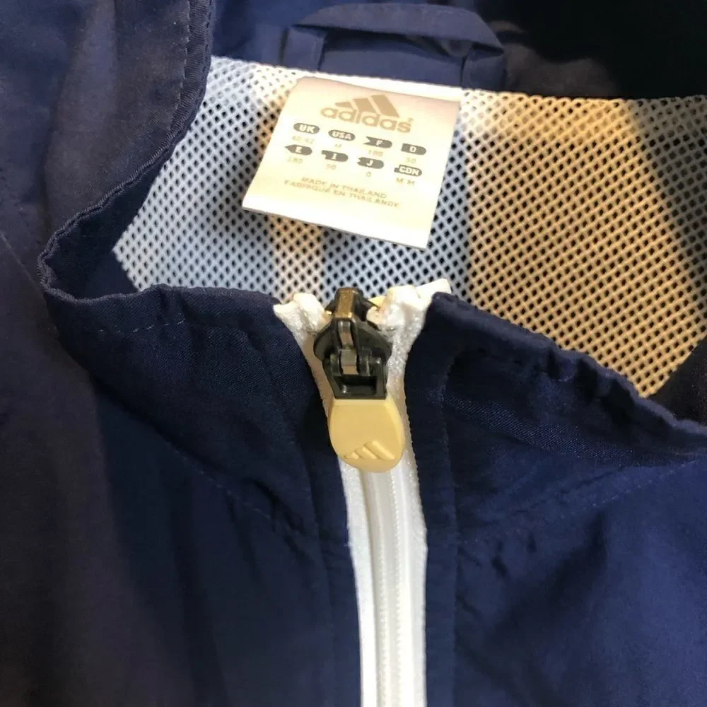 Adidas men’s windbreaker‎ in blue and white